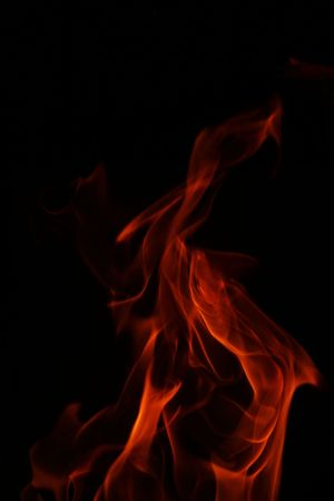 A flame on black, frozen in timeの写真素材