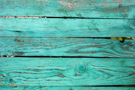 Wooden teal or turquoise green painted board. Vintage beach wood backdrop.の写真素材