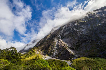 big waterfall in Milford Soundの写真素材