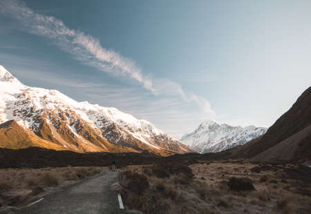 the path to mount cook with one person sunriseの写真素材