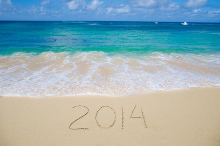 Number 2014 on the sandy beach - concept holidayの写真素材