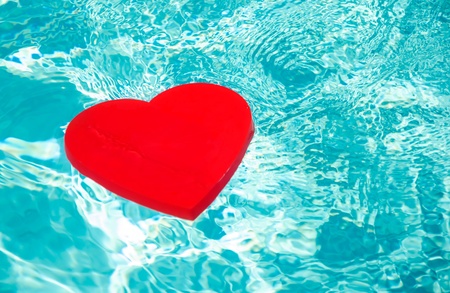 Heart shape in swimming pool - holiday conceptの写真素材