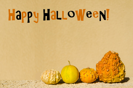 Orange background with pumpkins (Halloween concept)の写真素材