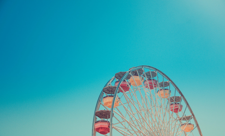 Ferris Wheel Over Sky Background, retro toningの写真素材