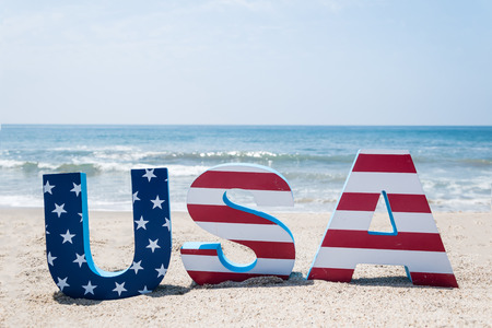 Patriotic USA  with decorations on the sandy beach