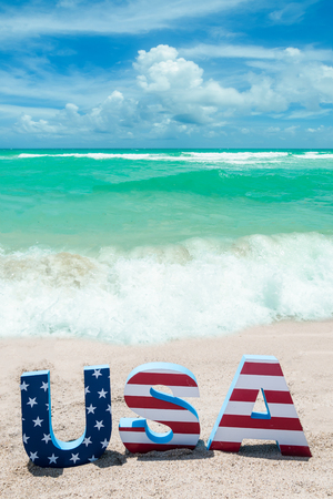 Patriotic USA  with decorations on the sandy beachの写真素材