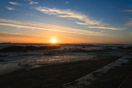 A landscape of the ocean at sunshine from Cape Townの写真素材