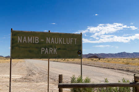 Road sign at entrance to Namib Naukluft Park, Namibiaの写真素材