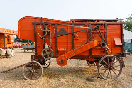 Old straw baler, agricultural vehicle, rural lifeの写真素材
