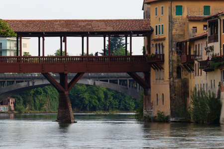 Panorama from Bassano del Grappa, old wooden bridge over Brenta river, italian landscapeの写真素材