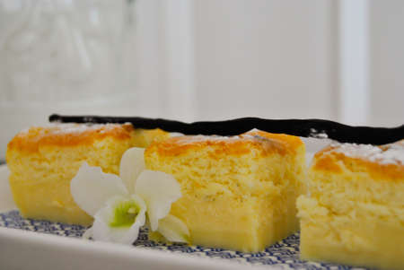 Vanilla magic cake over a white plate. Homemade dessert. Foodの写真素材