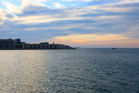Sunset in the port of Trieste, Italy. Italian panorama. Water and skyの写真素材