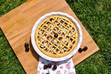 Close up of a cherries tart over a table. Food, dessert.の写真素材