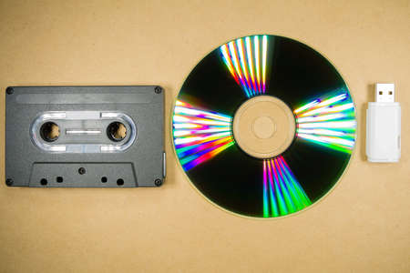 Concept of music evolution. Musicassette, cd and usb support. Vintage and modern. Supports for musicの写真素材