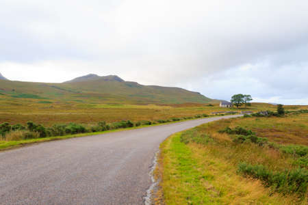 Scottish road trough countryside. Perspective road. Scotland panoramaの写真素材