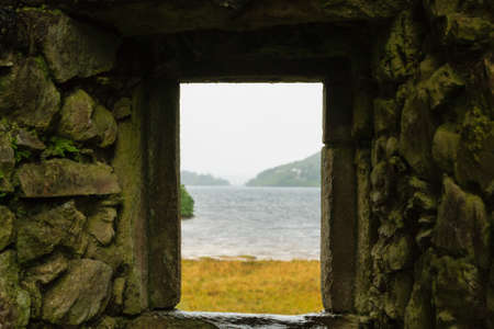 Rural panorama from Scotland. Grenn hills from Highlands region. Travel destinationsの写真素材