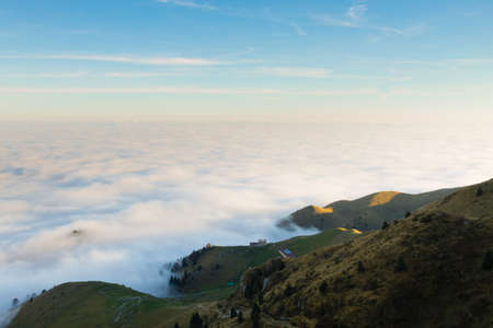 Panorama from Italian alps, carpet of clouds and peaks. Top mountain landscapeの写真素材