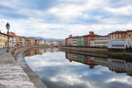 Pisa view. Buildings along Arno river. Italian landmark, Tuscanyの写真素材