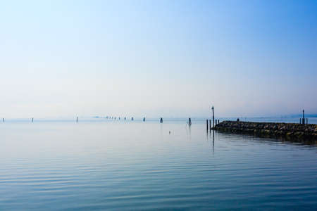 Breakwater on adriatic sea. Goro port view. Po Delta wetlands landmark. Italian travel destination