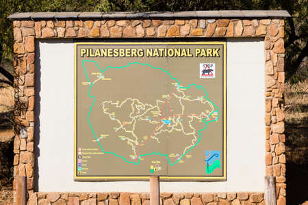 Pilanesberg National Park entry gate. Map of the park. Safari in Africa. South  Africaのeditorial素材