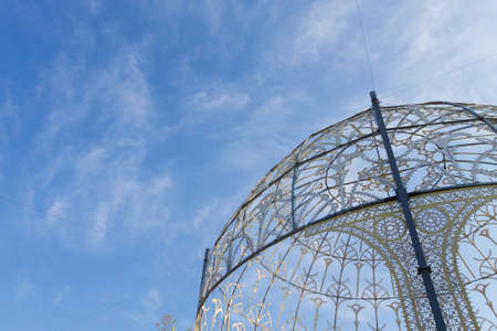 Steel structure town decoration. Texture on blue sky.の写真素材