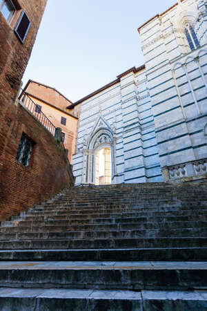 Day view of Siena Cathedral Santa Maria Assunta (Duomo di Siena) in Siena, Tuscany, italy.  Italian landmarkの写真素材
