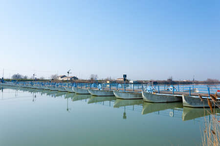 Bridge of boats perspective view. Po river lagoon. Italian landmarkの写真素材