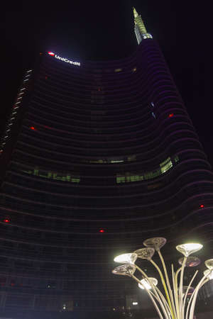 MILAN, ITALY-OCTOBER 30, 2016: Financial district night view. Modern skyscrapers in Gae Aulenti square. Unicredit bank towerのeditorial素材