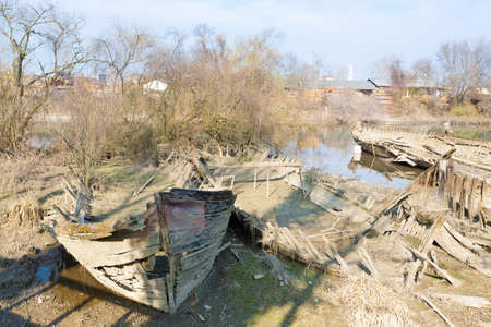 Old boats cemetery,Sile river natural park,Italy. Damaged fishing boats.の写真素材