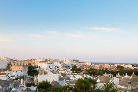 View of Alberobello with trulli roofs and terraces, Apulia region, Southern Italy. Famous Italian landmark. Typical villageの写真素材