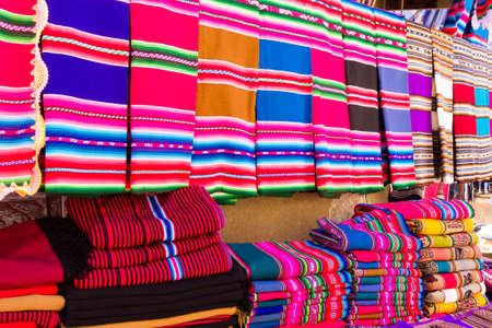 Tarabuco traditional market view, Bolivia. Colorful blankets backgroundの写真素材