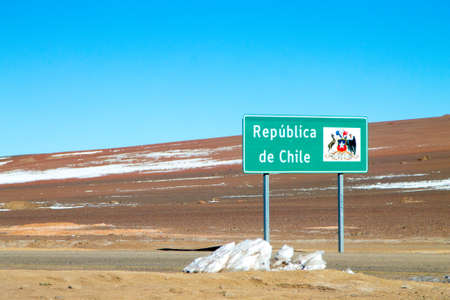 Chilean border road sign,Chile. Border across Chile and Bolivia. Andes altiplanoの写真素材