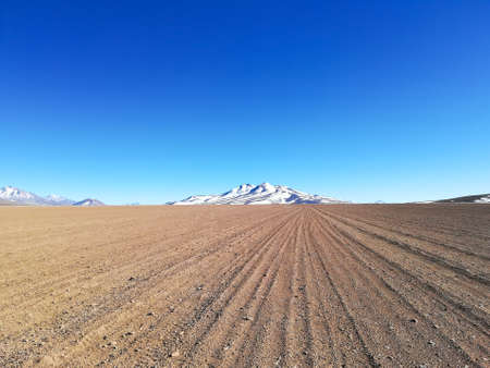 Bolivian mountains landscape,Bolivia. Andean plateau view. Dirt roadの写真素材