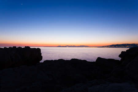 Sunset from Cap d'Antibes, France. Cannes coastline view. Beautiful french landscapeの写真素材
