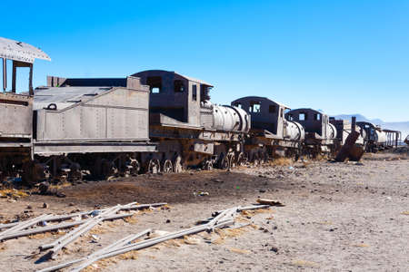 Cemetery trains view from Uyuni, Bolivia. Bolivian landmark. Abandoned locomotives