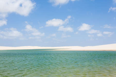 White sand dunes panorama from Lencois Maranhenses National Park, Brazil. Rainwater lagoon. Brazilian landscapeの写真素材