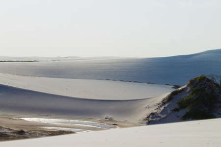 White sand dunes panorama from Lencois Maranhenses National Park, Brazil. Rainwater lagoon. Brazilian landscapeの写真素材