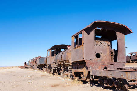 Cemetery trains view from Uyuni, Bolivia. Bolivian landmark. Abandoned locomotives