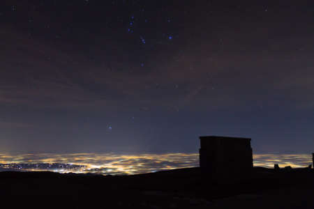 Monument with starry sky as a background. Mount Grappa war memorial view, Italian landmark.の写真素材