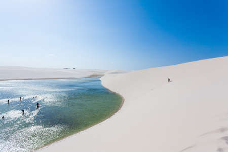 White sand dunes panorama from Lencois Maranhenses National Park, Brazil. Rainwater lagoon. Brazilian landscapeの写真素材
