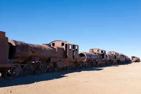 Cemetery trains view from Uyuni, Bolivia. Bolivian landmark. Abandoned locomotives