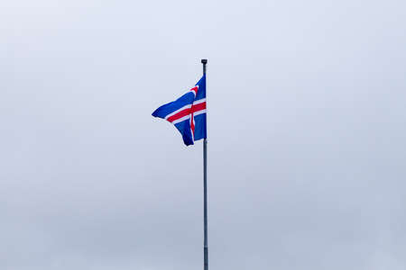 Iceland flag that waves in wind, Icelandic flag view.の写真素材