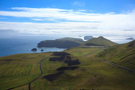 Westman Islands beach view with archipelago island in background. Iceland landscape.Vestmannaeyjarの写真素材