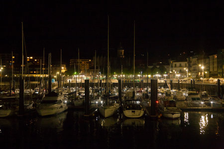 Lekeitio town night view from pier. Basque autonomous community, Spain.の写真素材