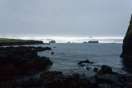 Vestmannaeyjar island beach view with Surtsey island in the background. Iceland landscapeの写真素材