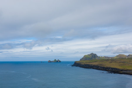 Westman Islands beach view with archipelago island in the background. Iceland landscape.Vestmannaeyjarの写真素材
