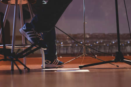 Feet of a musician while playing a songの写真素材