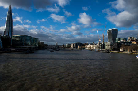 Modern building in the hearth of London City. Towers of glass and steel where thousand of people everyday works.の写真素材