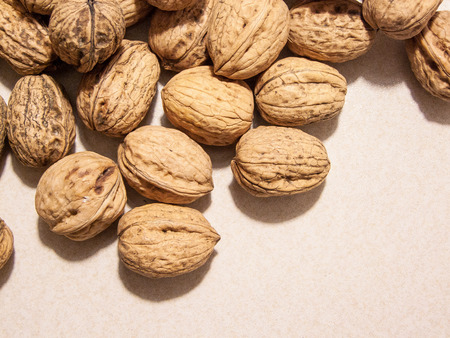 group of nuts on a pink tableの写真素材