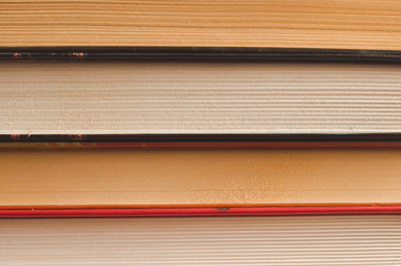 Stack of four books close up abstract background nobodyの写真素材